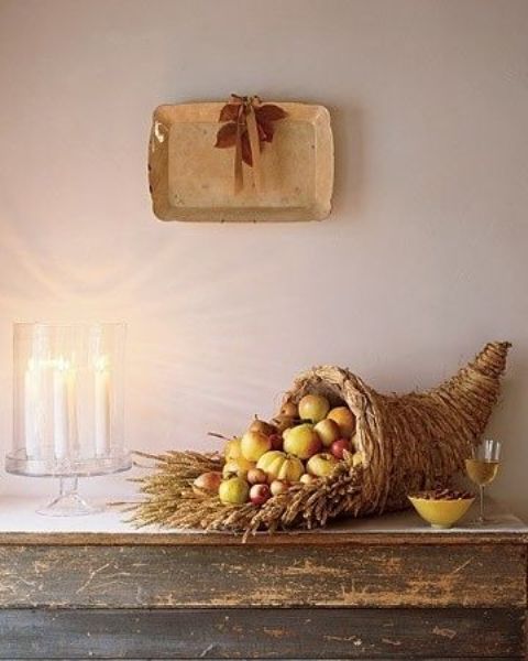 cornucopia filled with fruit and wheat can be easily DIYed