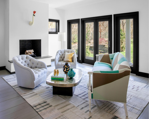 Gold and turquoise touches refresh the decor, and a simple rug adds coziness