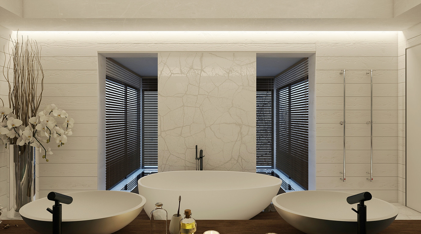 The master bathroom is clad with white marble and wood, there's a free standing bathtub