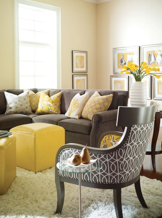 elegant mix of charcoal grey and bold yellow furniture, artworks and accessories