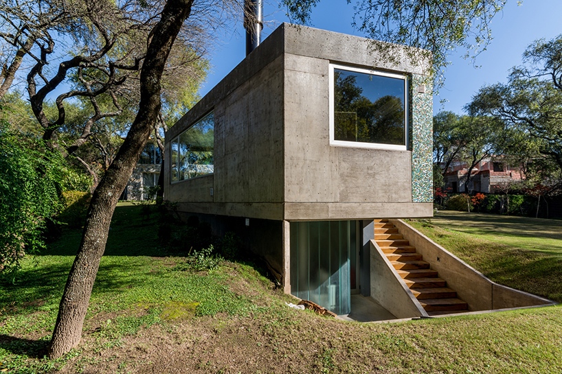 The dwelling is surrounded by trees that provide privacy