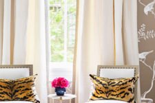 04 Antique chairs contrast with animal print cushions