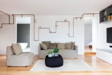 04 Exposed copper piping in the neutral living room looks awesome and adds a stylish industrial touch