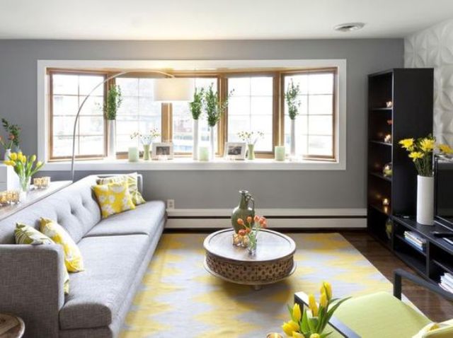 modern dove grey living room infused with bold yellow details looks refreshing