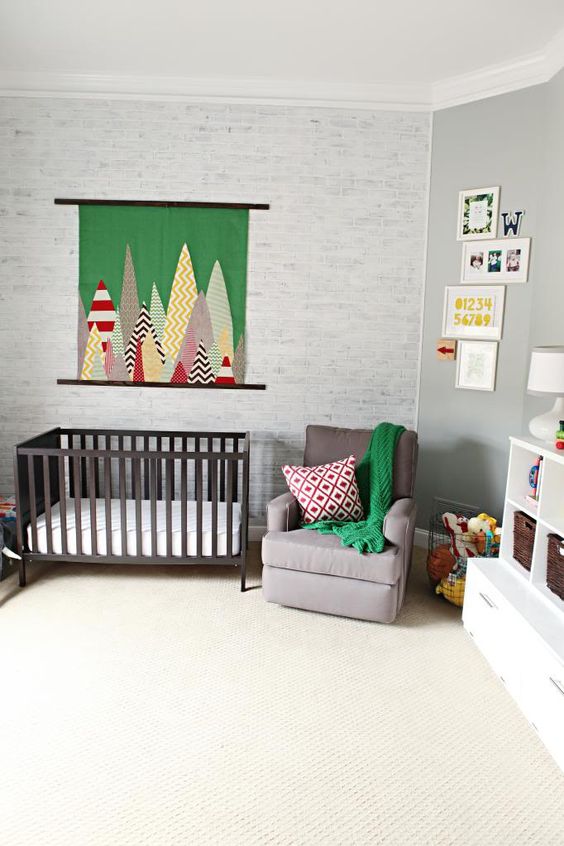 whitewashed brick wall keeps the nursery calm, peaceful and relaxing