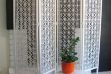 05 foldable laser cut screen that adds to the decor and separates spaces