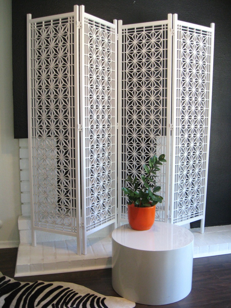foldable laser cut screen that adds to the decor and separates spaces