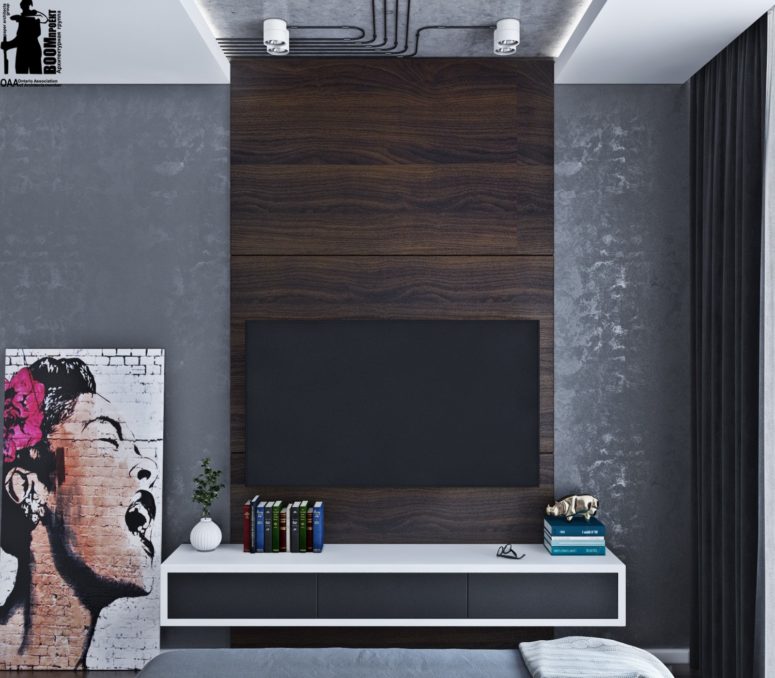 Concrete and dark plywood are used as contrasting finishes in the bedroom