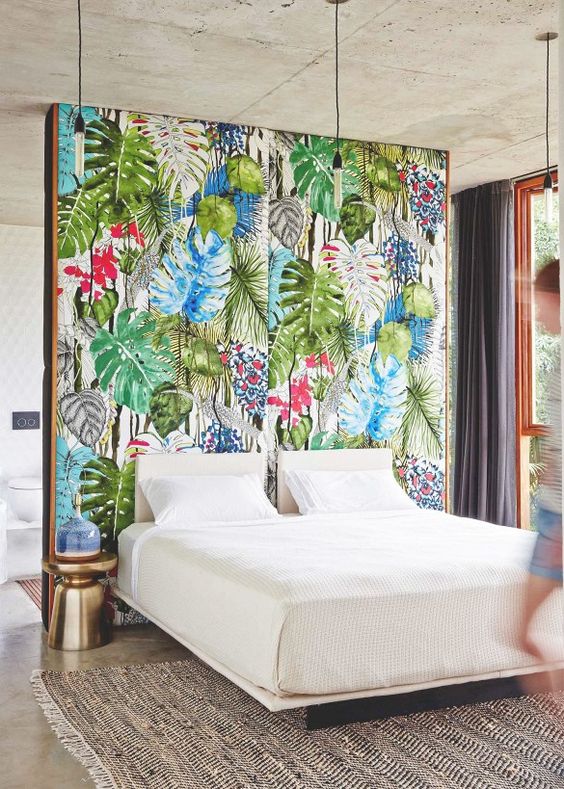 bold tropical fabric wall for a bedroom