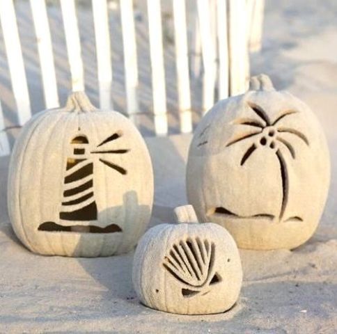beach-inspired white pumpkins rolled in sand