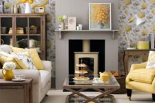 08 grey and yellow floral wallpaper, a grey fireplace panel and a yellow chair and pillows
