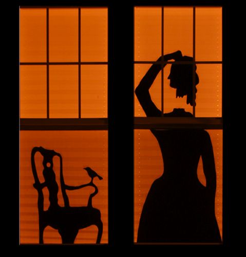 haunted house-inspired Halloween window silhouettes