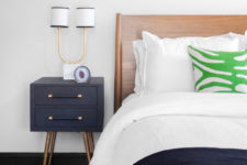 09 Small nightstands are mid-century modern, with gold touches and legs