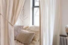 09 simple white curtains separate the comfy sleeping space making it more relaxing