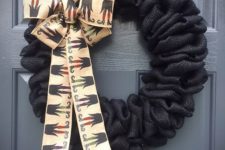 10 black burlap wreath with wiches’ legs ribbon