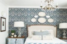 10 starch blue patterned fabric to the headboard wall to highlight the Provence style