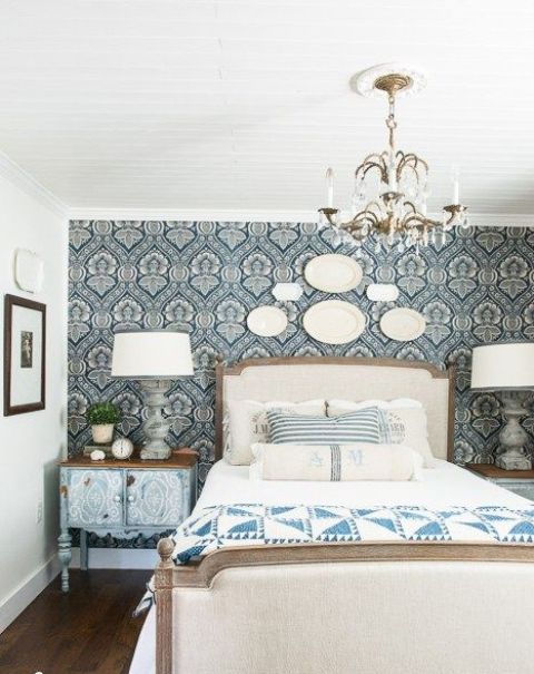 starch blue patterned fabric to the headboard wall to highlight the Provence style