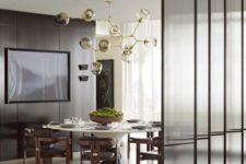 11 narrow framed glass screens add to the decor and separate areas without looking too bulky