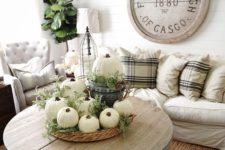 12 neutral decor with pumkins and greenery will bring a fall feel to the space