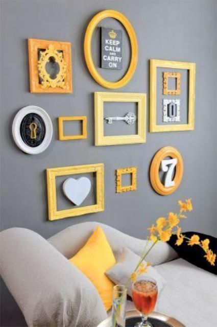 a grey gallery wall bold yellow frames