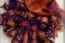 13 bold purple and orange wreath with a witch hat and legs