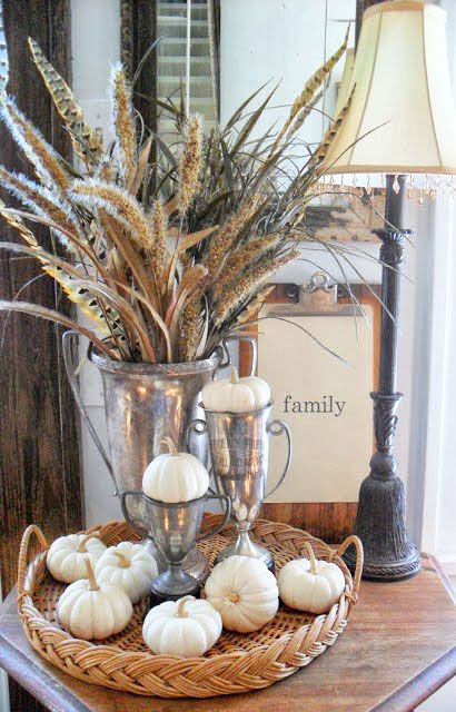 neutral pumpkins and spikelets in vintage cups
