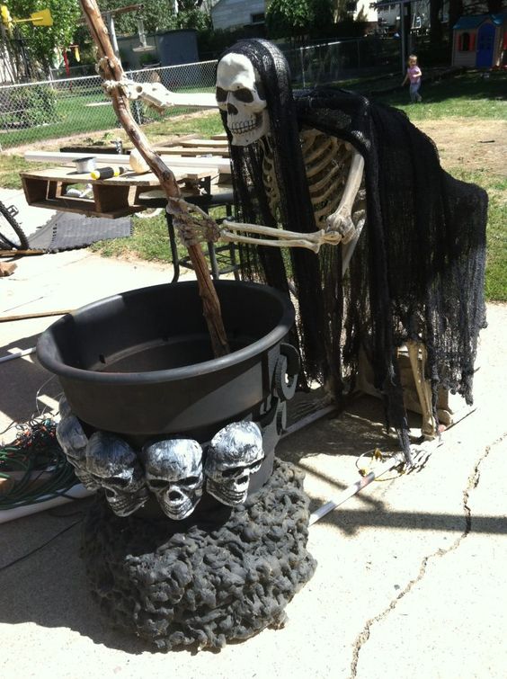 skeleton stirring something in a cauldron can be placed at your front porch or in the backyard