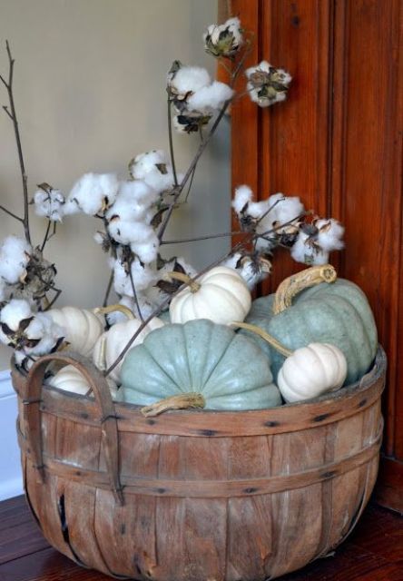 spray painted neutral pumpkins and cotton in a vintage wooden bucket