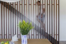 16 modern wooden screen to cover the staircase and make the dining area cozier