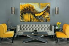 16 refined living room in grey shades looks bolder with yellow chairs and a painting