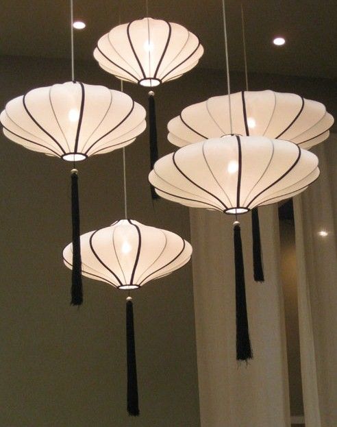 Asian paper lanterns with tassels are genius to add an Eastern flavor