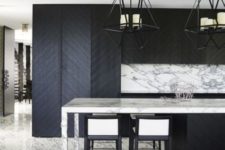 18 marble and chevron clad wood make this kitchen eye-catchy and interesting