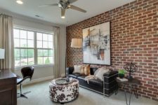 18 modern home office with an aacent brick wall and a wall art