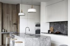 19 the waterfall countertop echoes with the backsplash