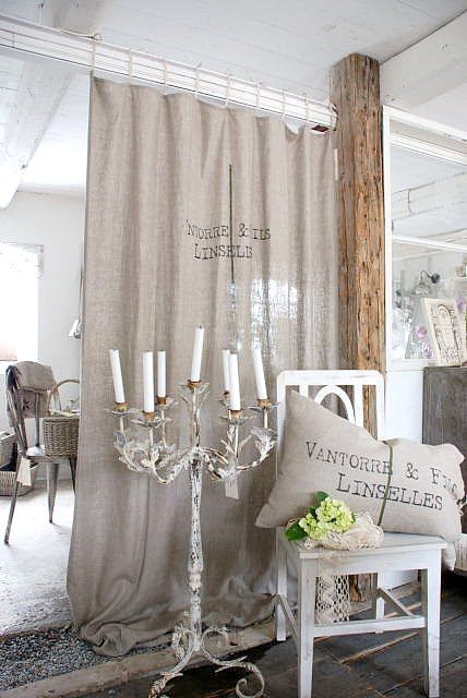 vintage burlap curtain adds to the shabby chic room decor
