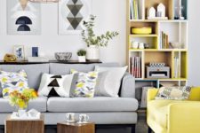 21 a light grey sofa with a bright yellow chair in the same style