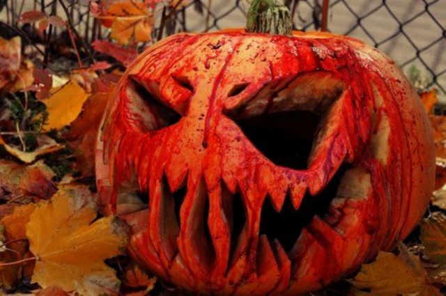 Spooky jack o lantern decorated with faux blood will be striking for Halloween