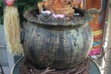 21 tiki party done right – a skeleton cooked in a cauldron