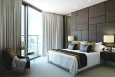 22 upholstered panel wall makes this bedroom modern and chic
