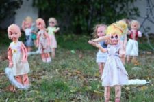 23 decorate old dolls and create a zombie doll backyard for cheap
