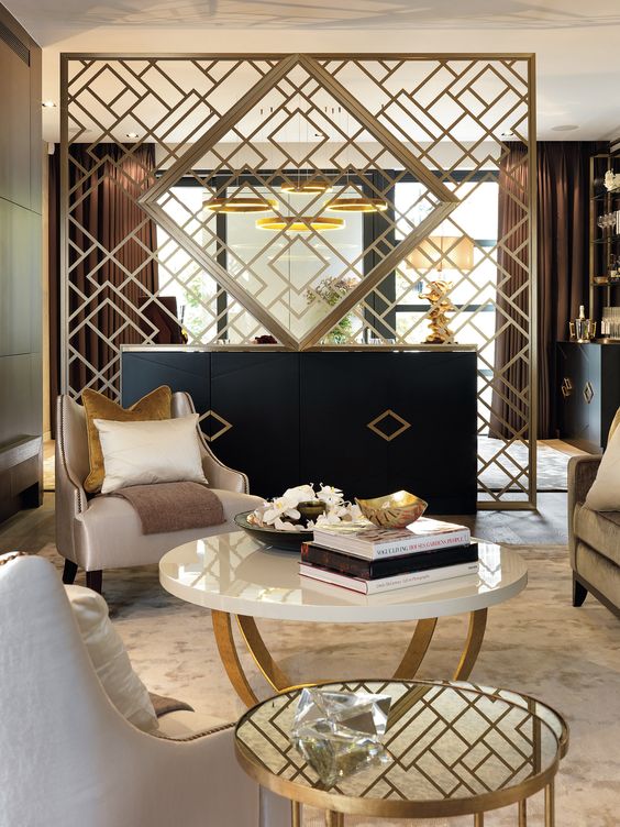 elegant geometric gilded screen creates an ambience in this room