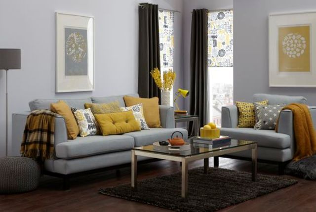 make an accent in a grey room using yellow cushions, lamps and flowers