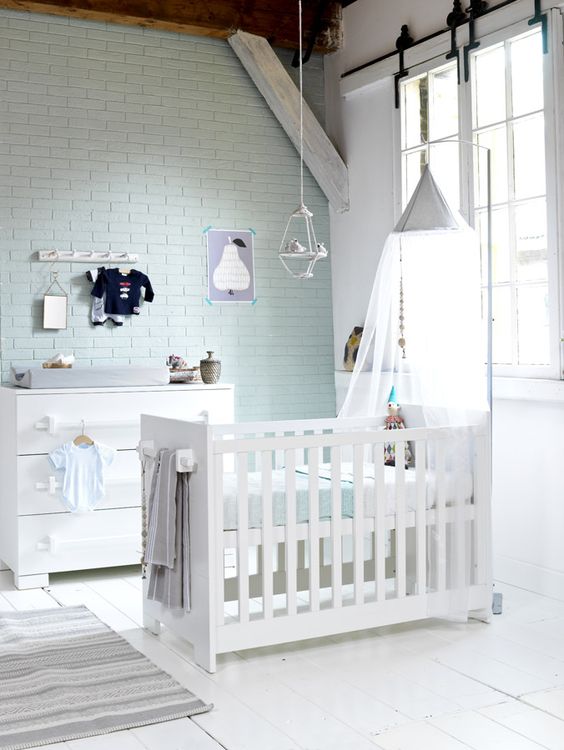 mint brick wall blends with neutral and subtle nursery decor