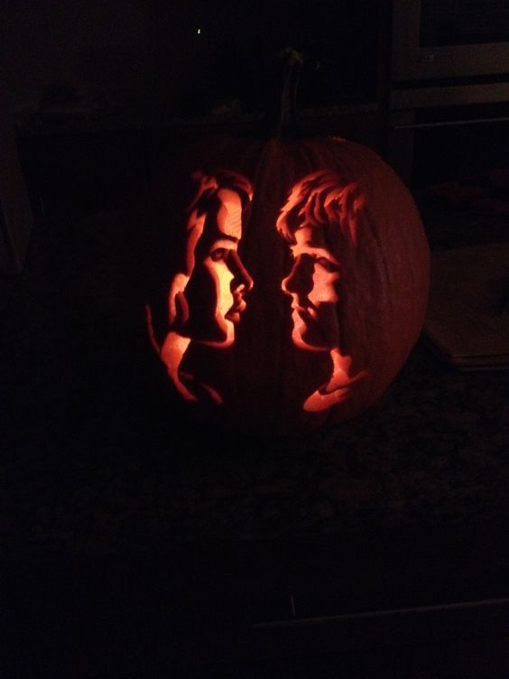 Katniss and Pete pumpkin carving