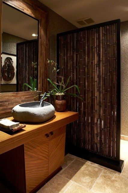 bamboo space divider, a stone sink for a spa-like bathroom