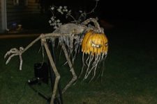 25 freaky Halloween figure with a pumpkin head