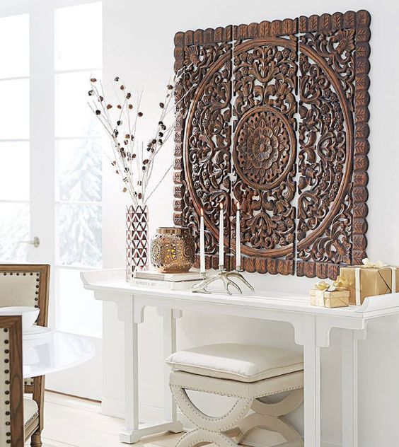 carved wood wall art panel is a bold piece and is organic