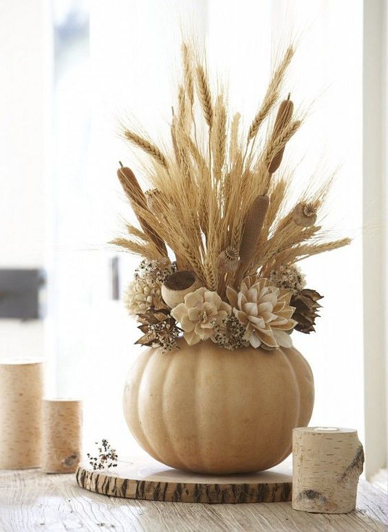 pumpkin vase with faux flowers, wheat
