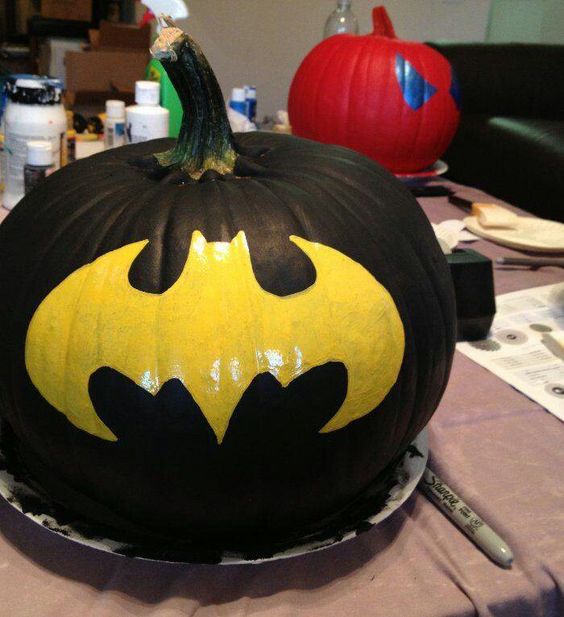 Batman painted pumpkin is an easy idea to recreate, you just need a template