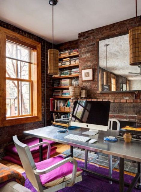 bold eclectic home office with brick walls for a unique look